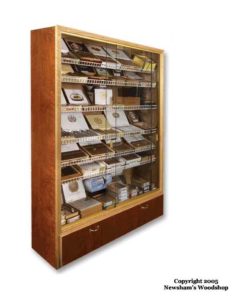 A display case filled with lots of different types of cigars.