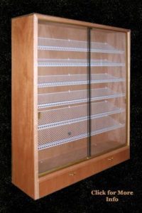 A wooden case with glass doors and shelves.