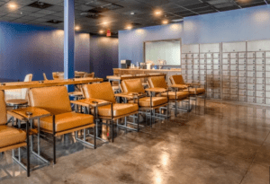 A room with many chairs and tables in it
