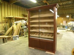 A large display case in the middle of a room.