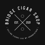 A black and white logo for bridge cigar shop.