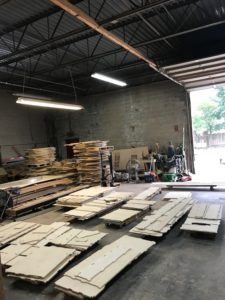 A warehouse filled with lots of wood.