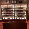 A display case with many different types of cigars.
