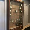 A large display case with many jars of different kinds.