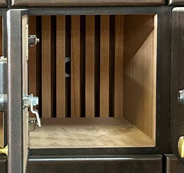 Low RPM fan bars mounted on solid Spanish cedar inside a custom cigar locker system