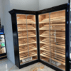 A large display case with many different types of cigars.