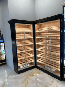 A large display case with many different types of cigars.