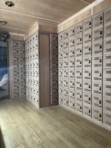 A room with many white lockers in it