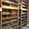 A large display case filled with lots of cigars.