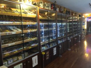 A room filled with lots of shelves full of different types of food.