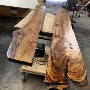 A table with two pieces of wood on top.