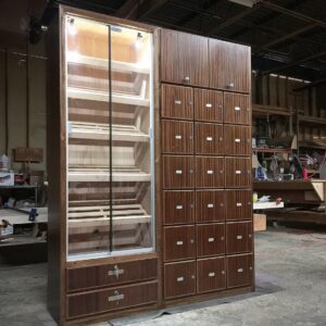 A large wooden cabinet with many drawers and shelves.