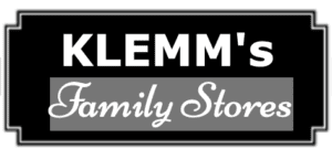 A black and white picture of klemm 's family store.