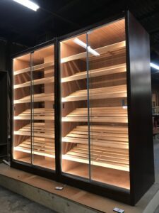 A large display case with lights on the side.