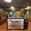 Leaf to Ash cigar lounge retail area with custom POS display and walk-in humidor by Newsham’s Woodshop