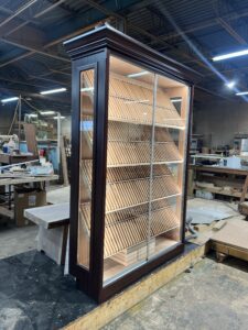 A large display case in the middle of a room.