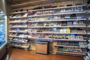 A store with many shelves of books and cds