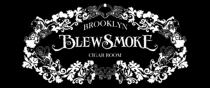 A black and white picture of brooklyn blewsmoke cigar room.