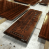 A group of wooden boards with holes in them.