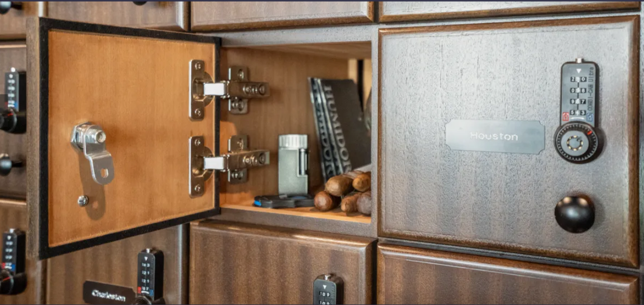 Custom cigar locker doors with individual locks and felt-lined seals